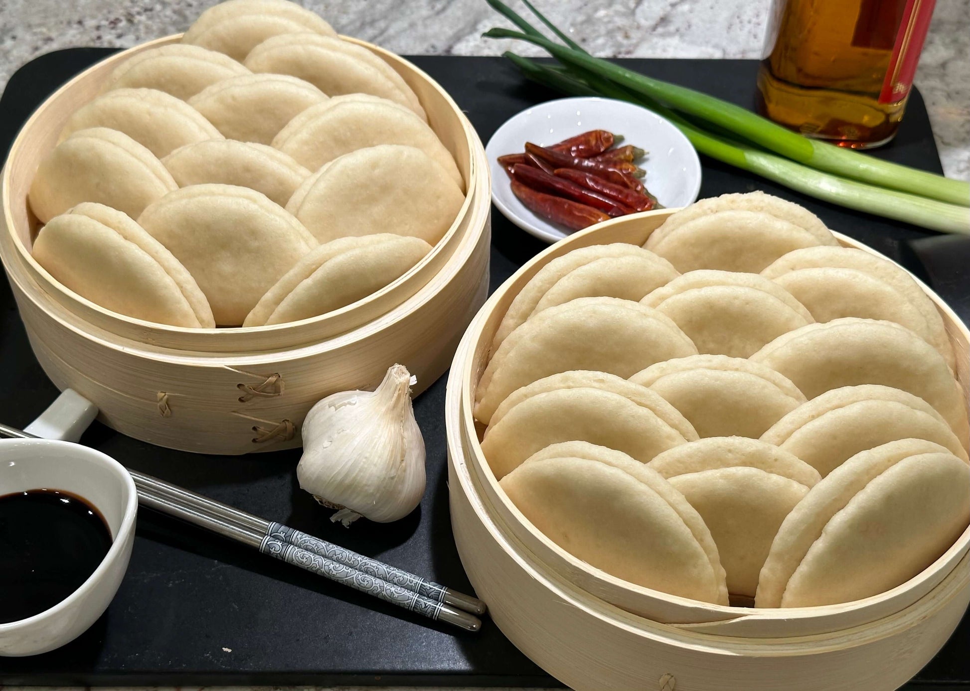 24 pack of gluten free baos in bamboo steamers